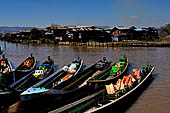 Inle Lake Myanmar. All the buildings are constructed on piles. Residents travel around by canoe, but there are also bamboo walkways and bridges over the canals, monasteries and stupas. 